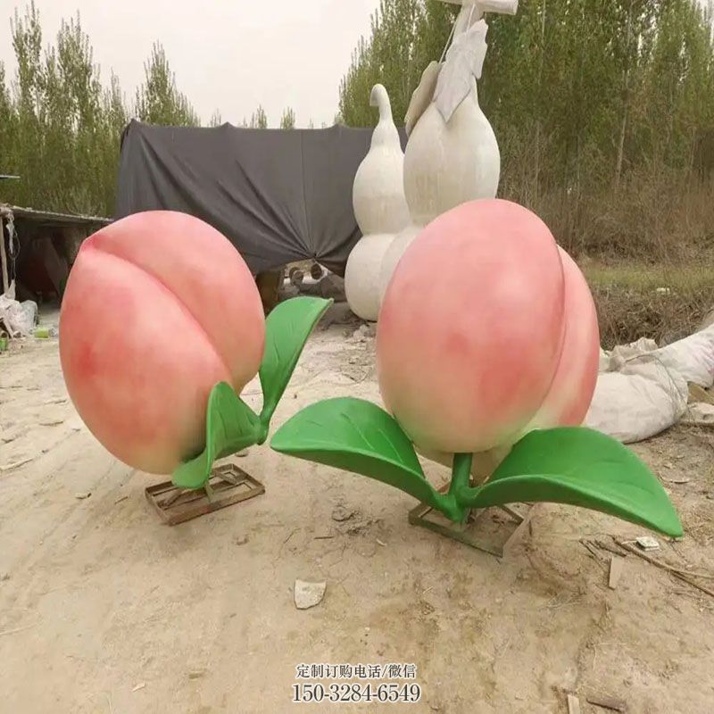 镜面桃子雕塑 园林景观雕塑摆件订做 城市广场果蔬雕塑提供
